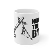 White mug with black telescope illustration and text on a white background