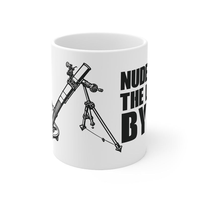 White mug with black telescope illustration and text on a white background
