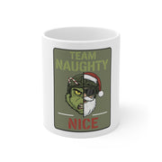 White mug with a graphic design of a character split between 'Team Naughty' and 'Nice', on a white background.