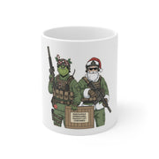 White mug with Christmas-themed graphic of a soldier and Grinch holding weapons and a box.