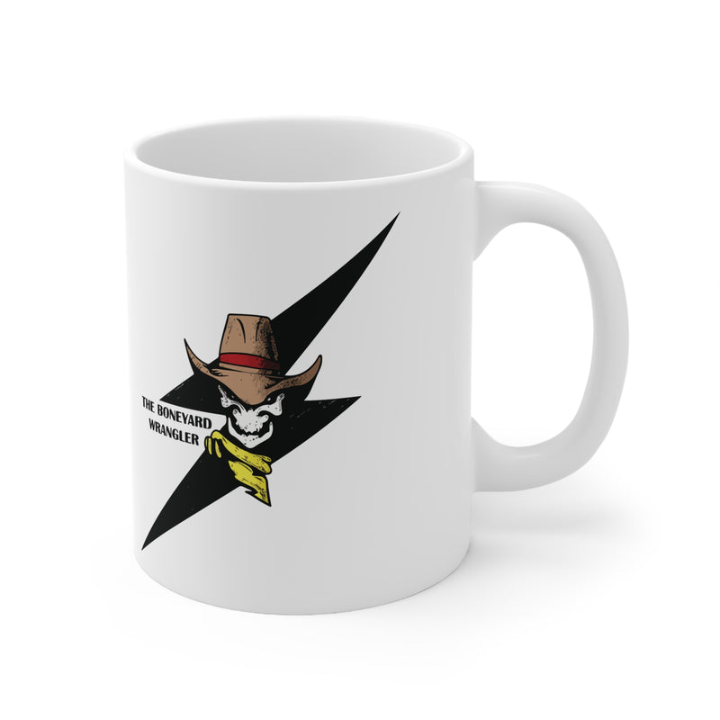 White mug with a graphic design featuring a cowboy hat and star on a white background