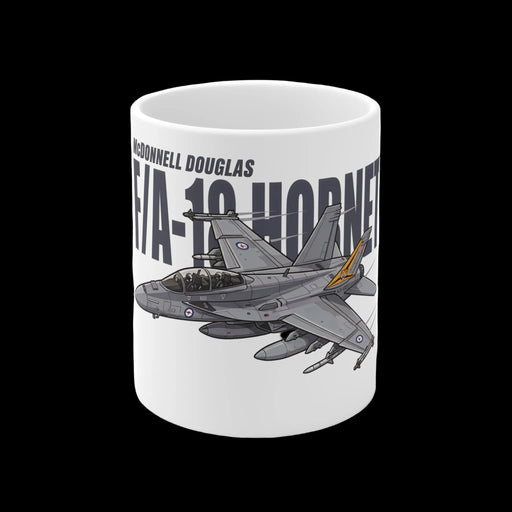 A white ceramic mug featuring a printed graphic of a McDonnell Douglas F/A-18 Hornet fighter jet in gray with a small orange accent, alongside the text 'McDonnell Douglas' and 'F/A-18 HORNET'.