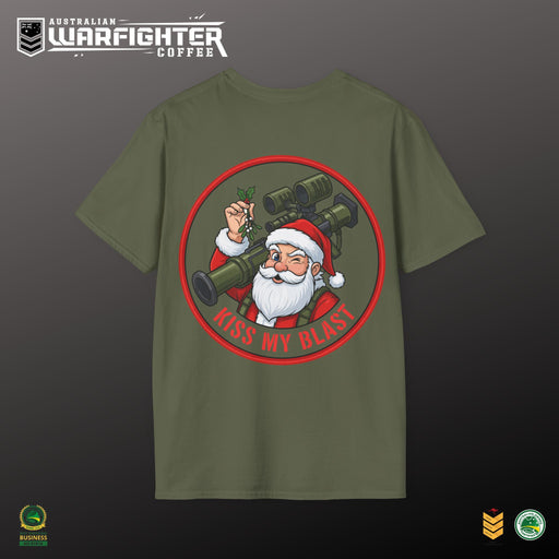 Green t-shirt with Santa Claus holding a cannon and 'Kiss My Blast' text on a dark background, featuring the Australian Warfighter Coffee brand.